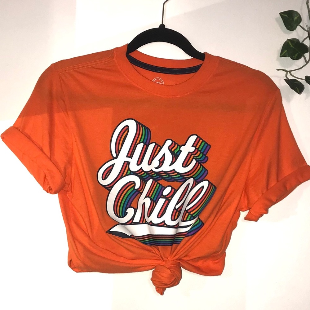 Bright orange graphic tee shirt